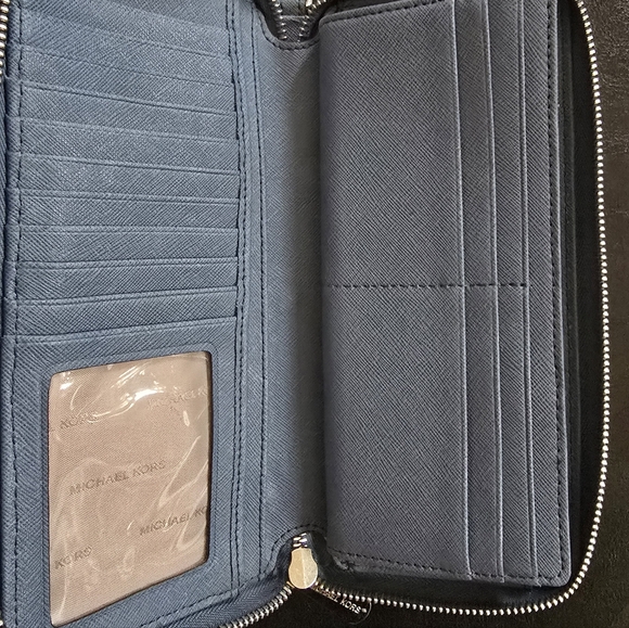 Michael Kors wallet. Blue in color. Zippered. - Picture 3 of 4